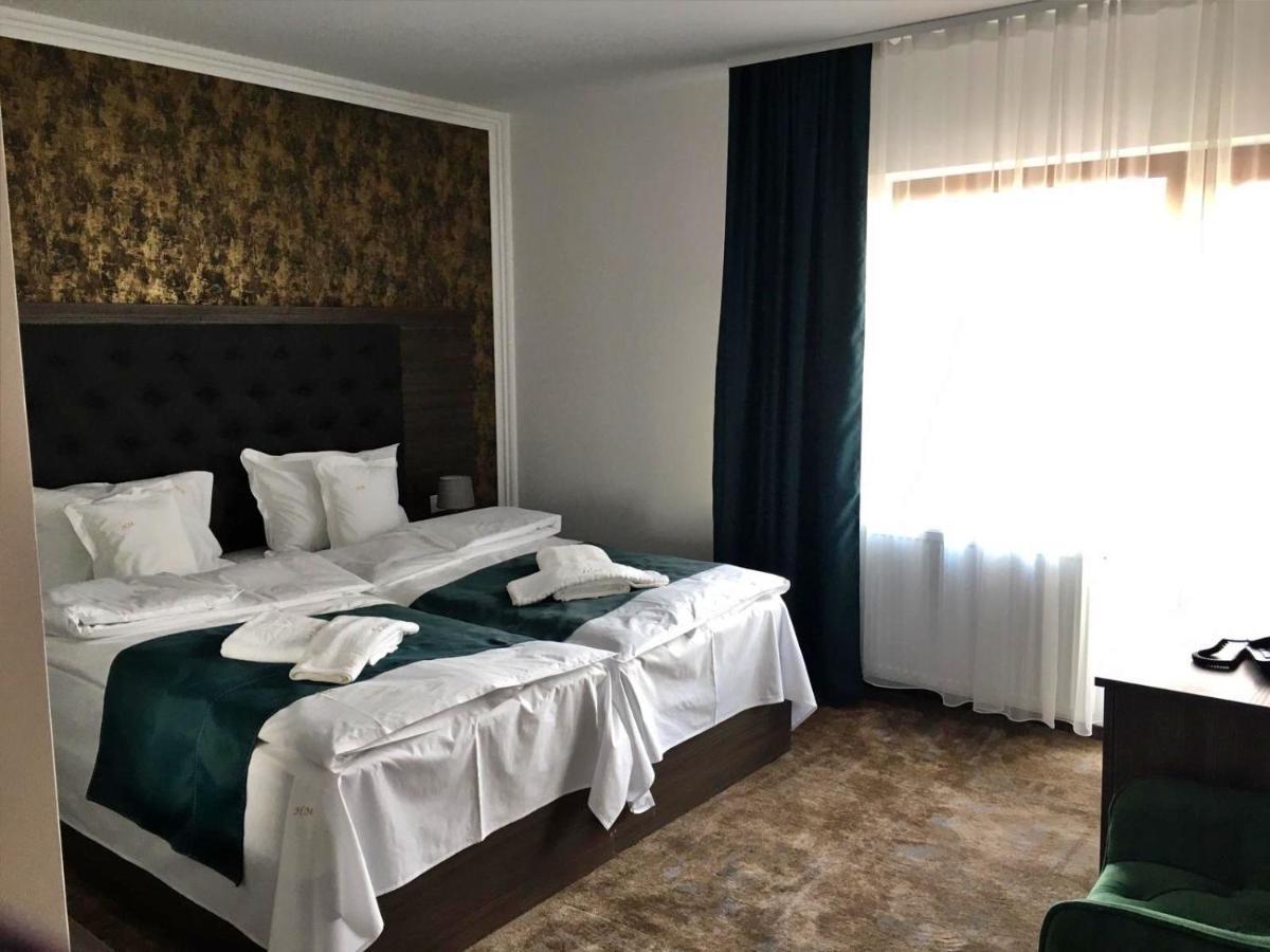 Cameră twin cu balcon