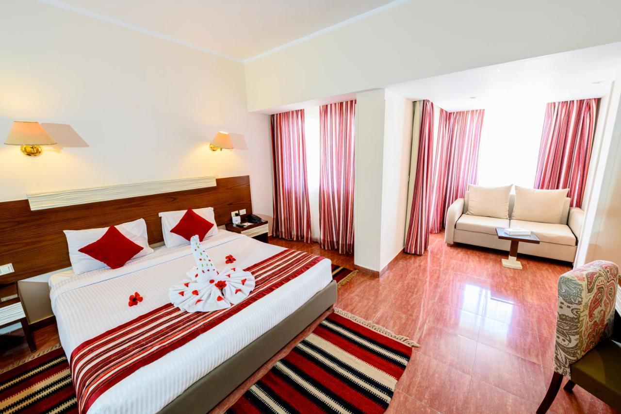 Deluxe Double Room with Side Sea View,972983626:JPEG