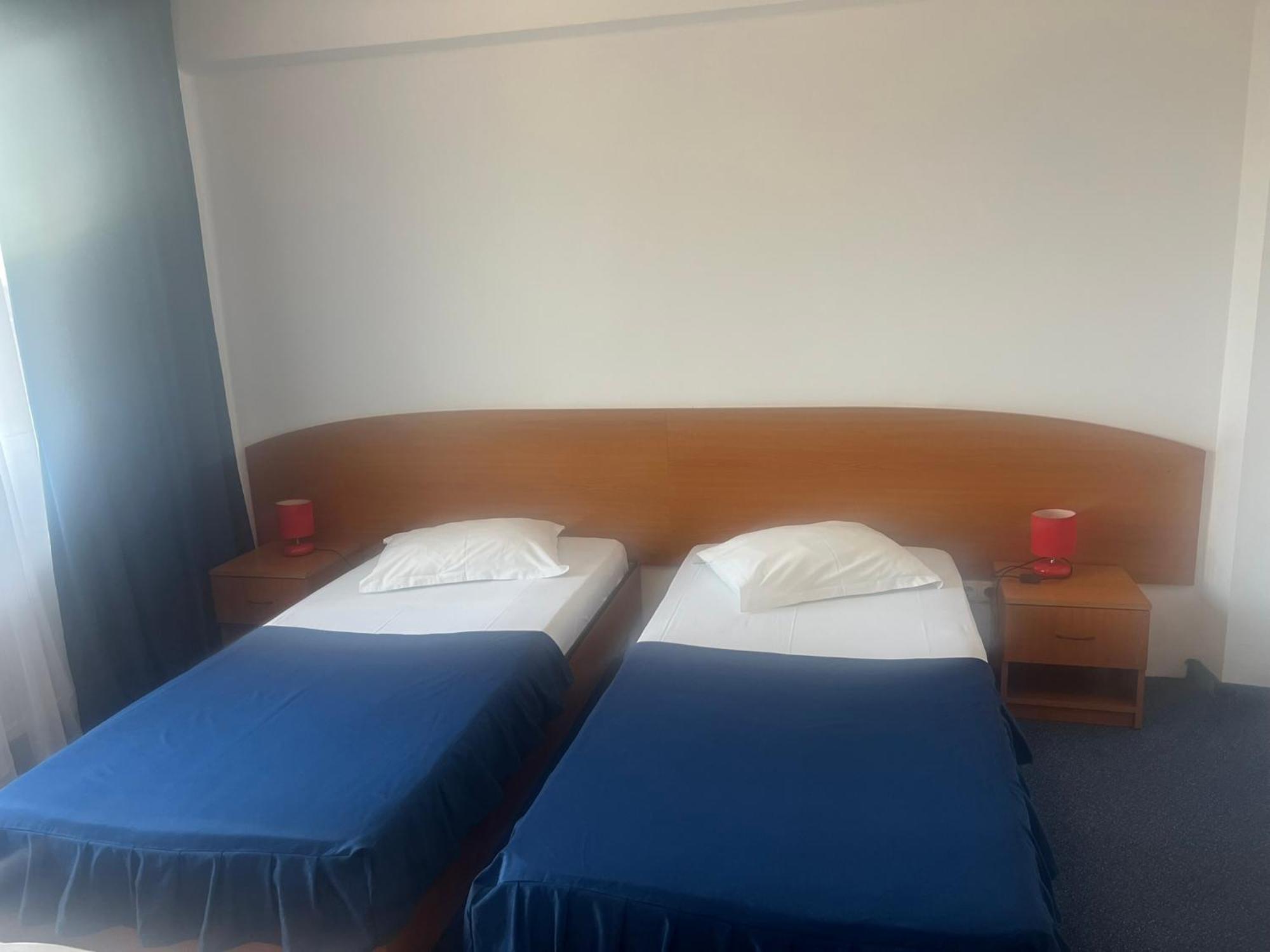 Cameră twin cu balcon