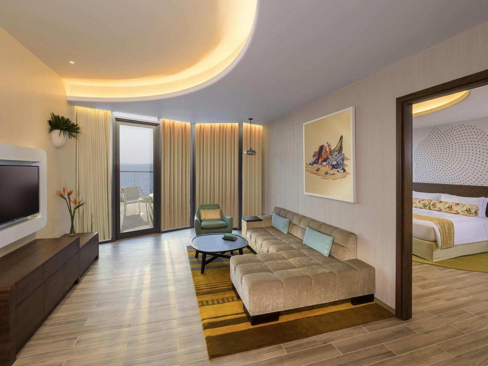 Deluxe One-Bedroom Suite Balcony Partial Sea View Club Lounge Access,1731514320:JPEG