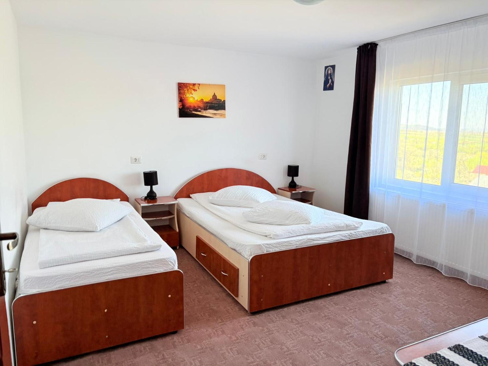 Cameră triplă cu baie privată