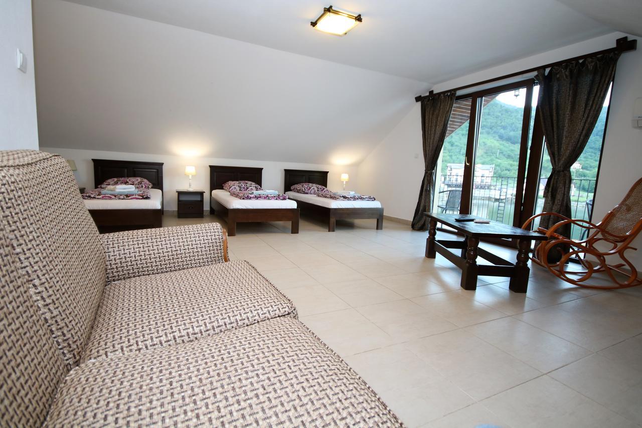 Deluxe Triple Room Sea View,653857764:JPEG